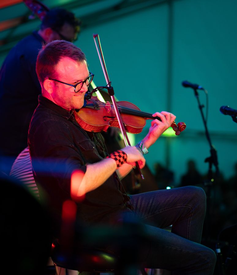 A man playing a violin.