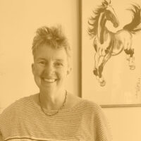 A woman smiling.