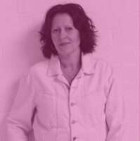 A woman in a white shirt.